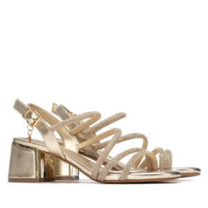 Γυναικεία χρυσά πέδιλα Xti 145260 με λουράκια με στρας και σταθερό block heel τακούνι